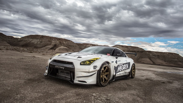 White sports car desert cloudy #2 free wallpaper for desktop - medium preview image