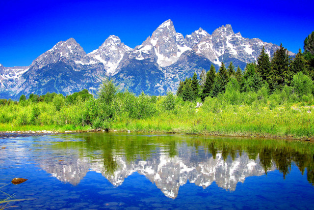 Mountain range reflection lake meadow free wallpaper for desktop - medium preview image