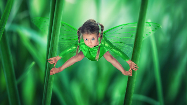 Little girl green plant background free wallpaper for desktop - medium preview image