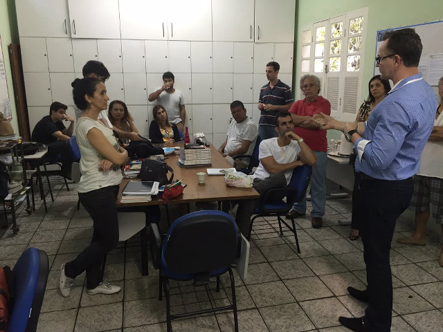 Group people table room white free wallpaper for desktop - medium preview image