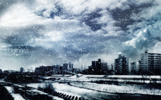 Snowy city cloudy sky buildings free wallpaper for desktop - medium preview image