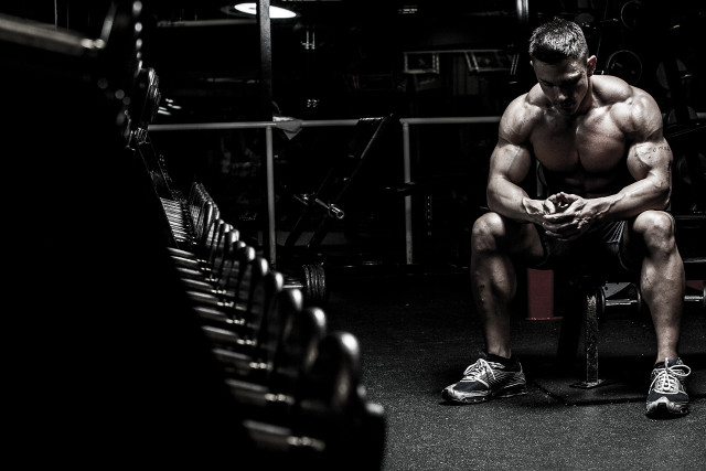 Man sitting bench gym hands free wallpaper for desktop - medium preview image