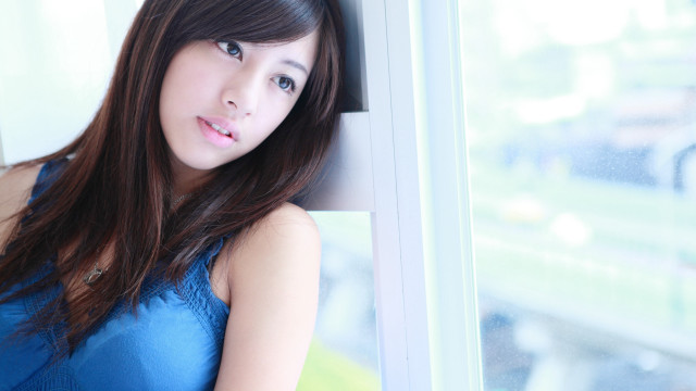 Woman blue dress window sill free wallpaper for desktop - medium preview image
