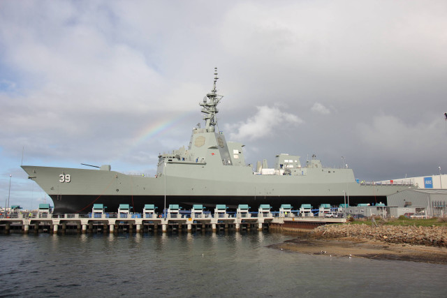 Military ship docked pier rainbow free wallpaper for desktop - medium preview image
