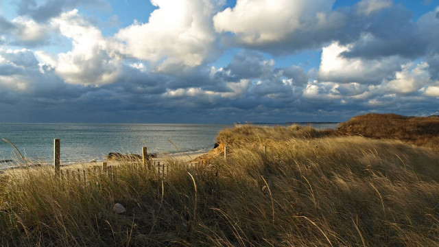 Beach fence water clouds sky free wallpaper for desktop - medium preview image