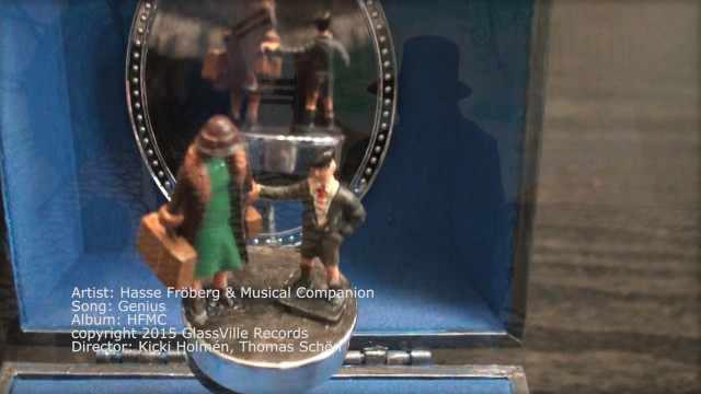 Toy figurine mirror blue background free wallpaper for desktop - medium preview image