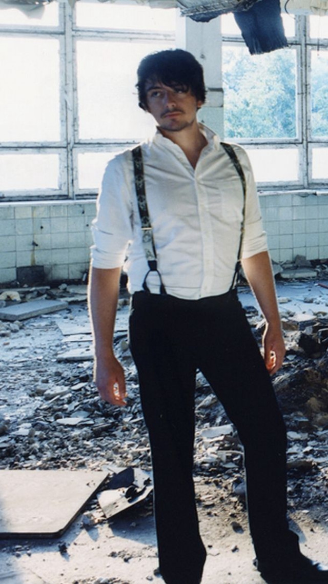 Man white shirt suspenders broken free wallpaper for mobile - medium preview image