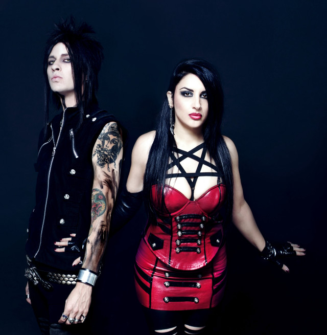 Man woman leather outfits posing free wallpaper for tablet - medium preview image