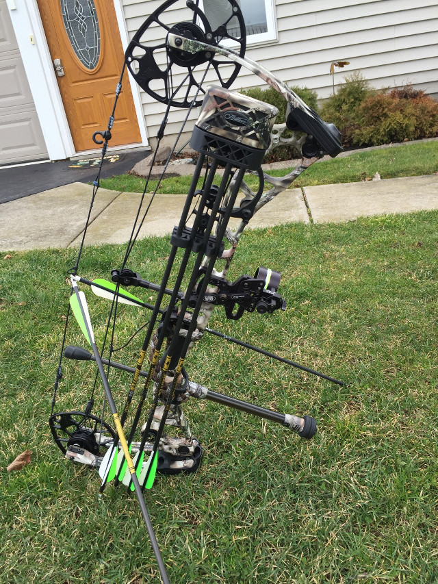 Bow rack bow arrows grass free wallpaper for mobile - medium preview image