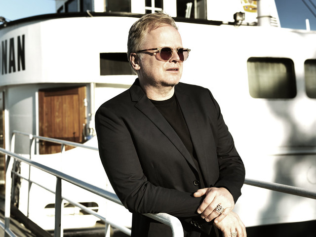 Man suit sunglasses boat portrait free wallpaper for desktop - medium preview image