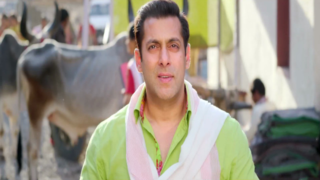 Man green shirt cow village free wallpaper for desktop - medium preview image