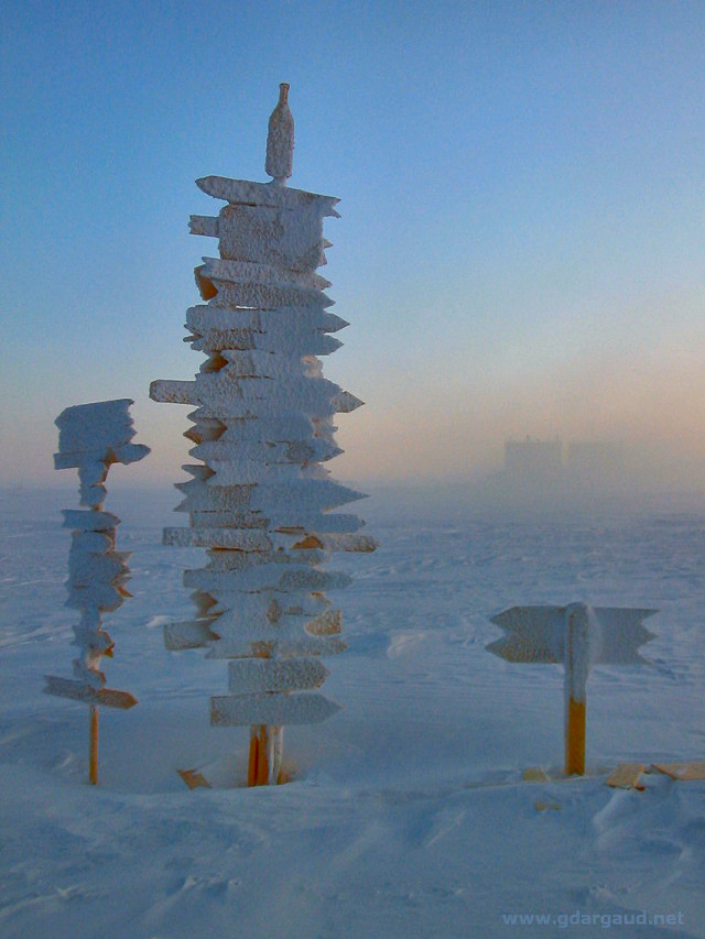 Pole signs snow sky building free wallpaper for mobile - medium preview image