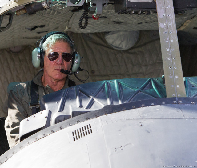 Man pilot seat headphones nosepiece free wallpaper for desktop - medium preview image