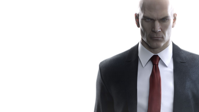 Man suit tie bald serious free wallpaper for desktop - medium preview image
