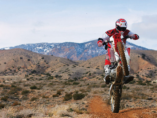 Dirt bike desert mountains cloudy free wallpaper for desktop - medium preview image