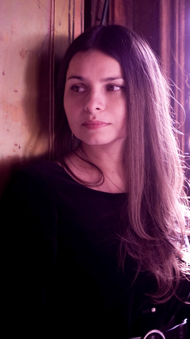 Woman long hair clock window free wallpaper for mobile - medium preview image