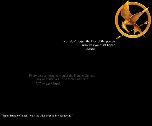 Black background gold logo mockingjay free wallpaper for desktop - medium preview image
