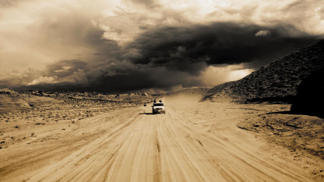 Truck dirt road cloudy sky free wallpaper for desktop - medium preview image