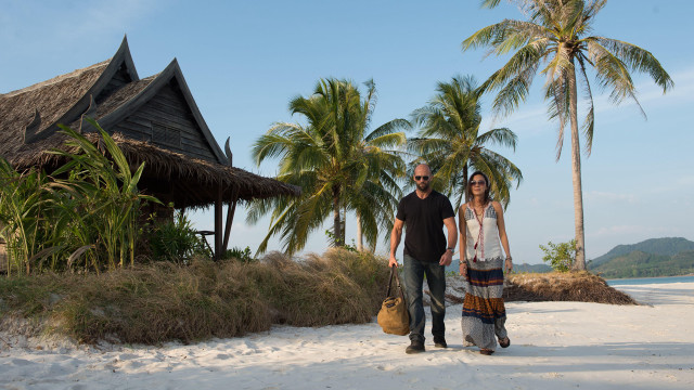 Beach palm trees hut man free wallpaper for desktop - medium preview image