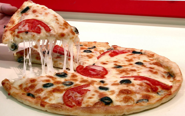 Person taking slice pizza white free wallpaper for desktop - medium preview image