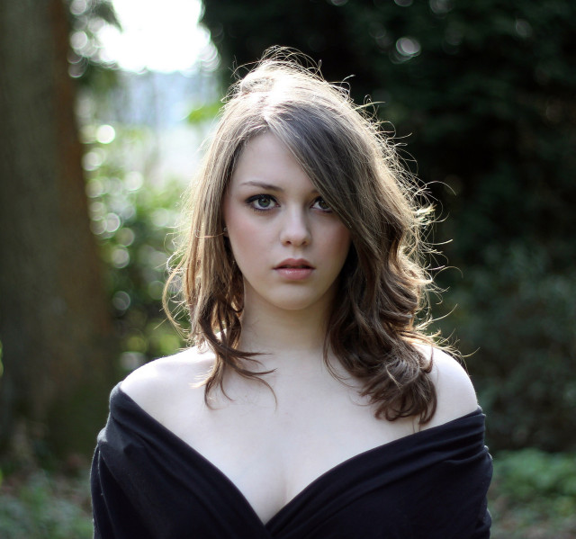 Woman black dress woods sunlight free wallpaper for tablet - medium preview image