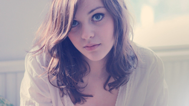 Woman blue eyes white shirt #3 free wallpaper for desktop - medium preview image