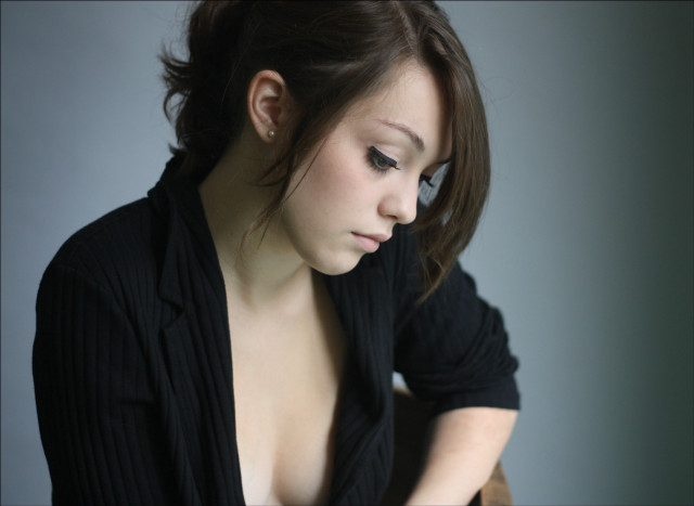 Woman black shirt jacket cellphone free wallpaper for desktop - medium preview image