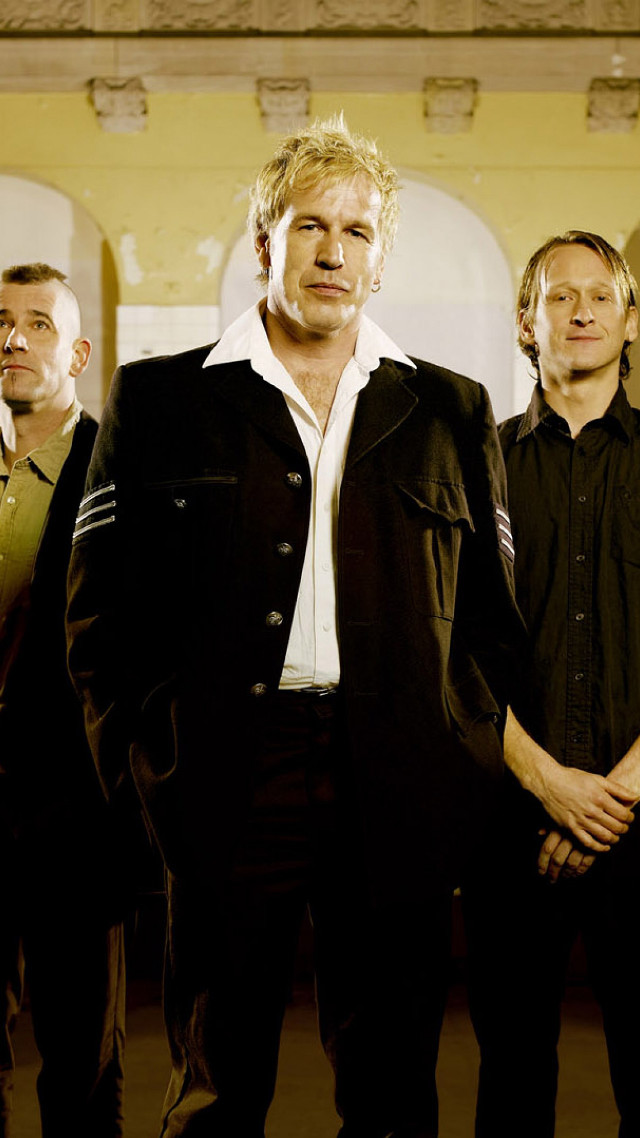 Men standing bauhaus building clock free wallpaper for mobile - medium preview image