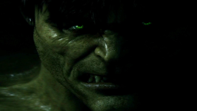 Man green eyes dark background free wallpaper for desktop - medium preview image