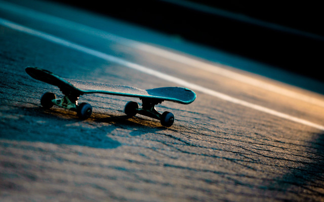 Skateboard laying ground wheels side #2 free wallpaper for desktop - medium preview image