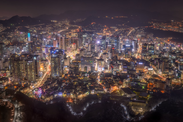 City night lights buildings mountains free wallpaper for desktop - medium preview image