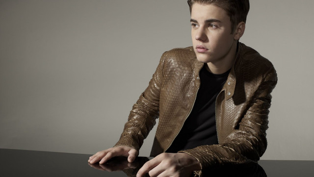 Man sitting table brown jacket free wallpaper for desktop - medium preview image