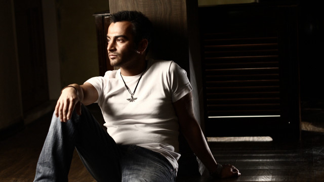 Man sitting floor room wooden free wallpaper for desktop - medium preview image