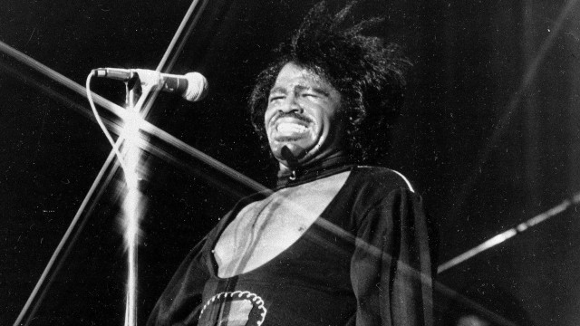 Man microphone singing 1970s funk free wallpaper for desktop - medium preview image