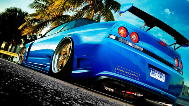 Blue car palm trees sky free wallpaper for desktop - medium preview image