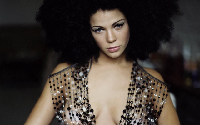 Woman large afro posing hands free wallpaper for desktop - medium preview image