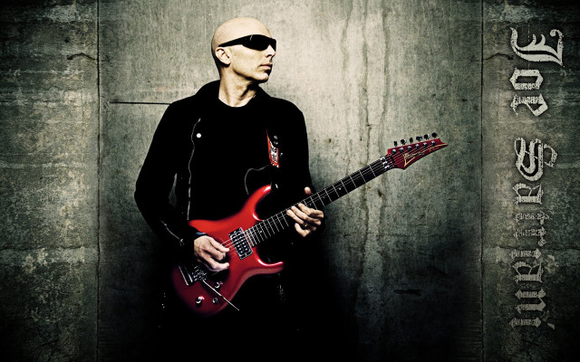 Man sunglasses red guitar wall free wallpaper for desktop - medium preview image