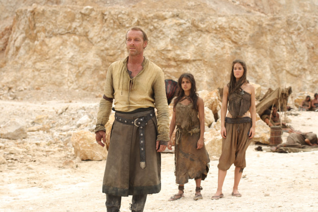 Mountain side brown outfit figurative free wallpaper for desktop - medium preview image