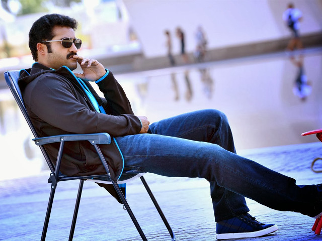 Man chair smoking cigarette public free wallpaper for desktop - medium preview image