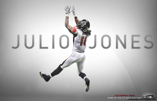 Football player jumping hands up free wallpaper for desktop - medium preview image
