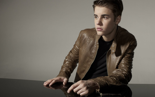 Man sitting table brown jacket #2 free wallpaper for desktop - medium preview image