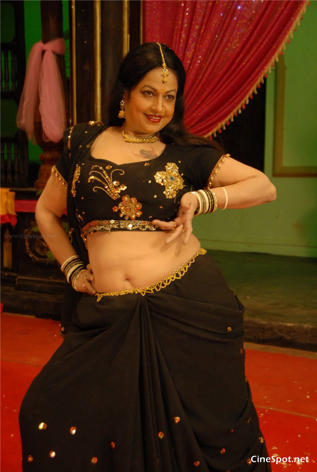 Woman black sari dancing stage free wallpaper for mobile - medium preview image