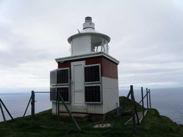 Small white red building hill free wallpaper for desktop - medium preview image