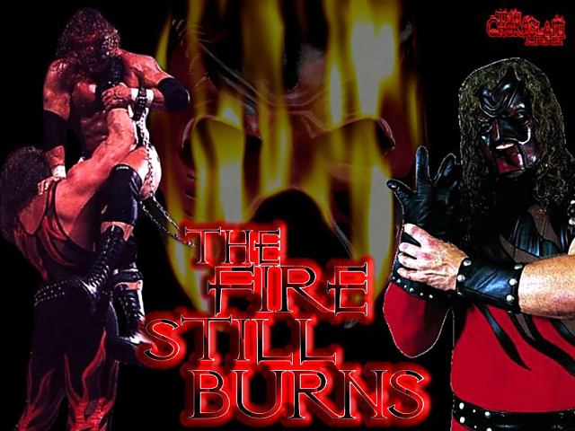 Man wrestling outfit holding woman free wallpaper for desktop - medium preview image