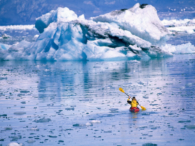 Kayaker yellow kayak iceberg ocean free wallpaper for desktop - medium preview image