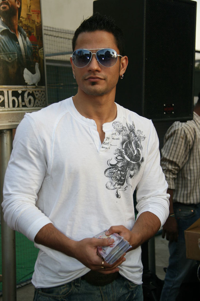 Man sunglasses cellphone poster standing free wallpaper for mobile - medium preview image