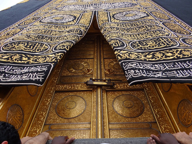 Person standing golden door cross free wallpaper for desktop - medium preview image