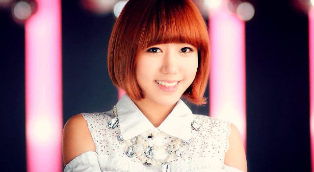 Red hair smiling woman pink free wallpaper for desktop - medium preview image