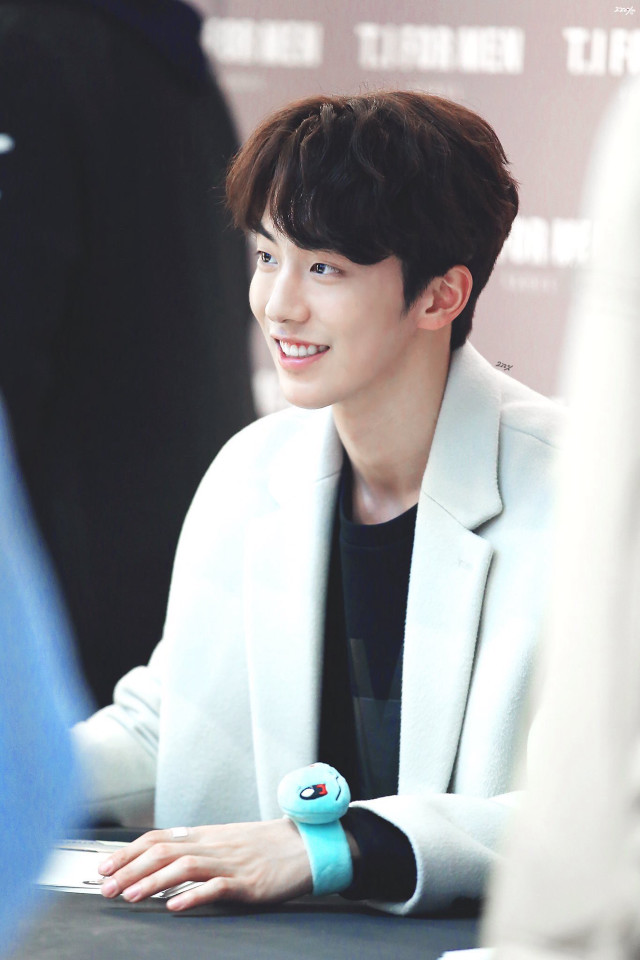 Man smiling table blue object free wallpaper for mobile - medium preview image