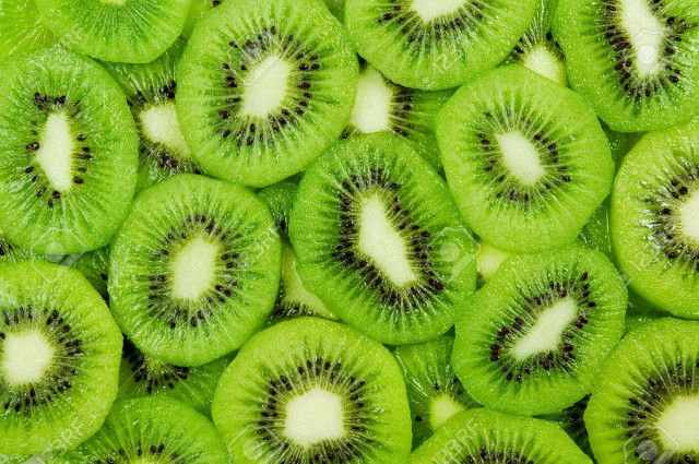 Kiwi fruit close up white free wallpaper for desktop - medium preview image